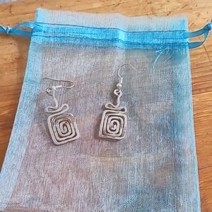 Silver earrings from Greece.